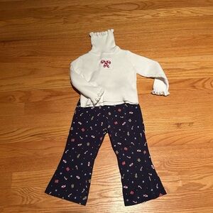 Kids Sonoma Christmas Candy Cane turtle neck and holiday navy leggings.